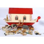Mid-century painted wood model of Noah's ark, the top hinged to reveal interior with painted wood