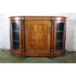 Late 19th century figured walnut credenza, the bow front cabinet with large door to the centre,