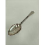 Silver table spoon with feather edges, crested by Bateman 1783.