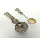 Japanese silver spoon modelled as a Geisha and a Chinese spoon. (2).
