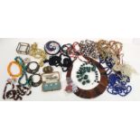 Quantity of bead necklaces and other items.
