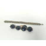 Victorian sardonyx bracelet of seven cabochons in low grade gold, and another of Indian silver