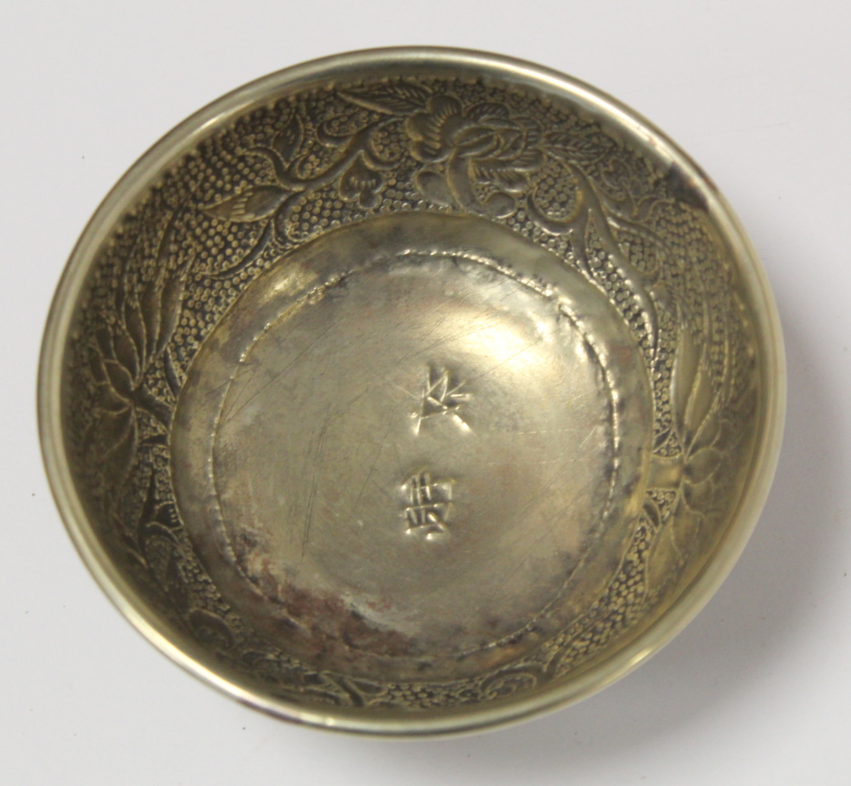 Chinese small white metal bowl with repousse floral band to exterior and two punched character marks - Image 6 of 13