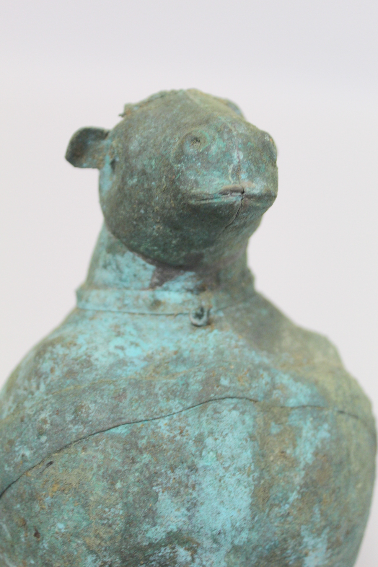 Archaistic naive hollow bronze figure of a ram, the rotund body with rivet effect band and collar - Image 10 of 10