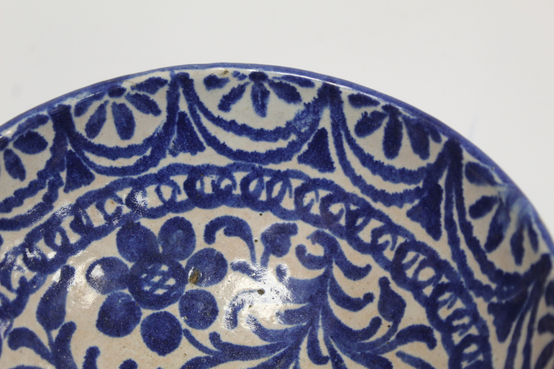 Middle Eastern small earthenware blue and white circular bowl decorated with stylised flowers and - Image 5 of 12