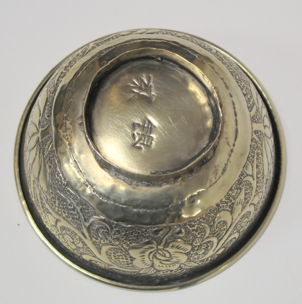 Chinese small white metal bowl with repousse floral band to exterior and two punched character marks - Image 7 of 13