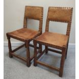 Robert "Mouseman" Thompson set of eight oak brass studded dining chairs, each with hide