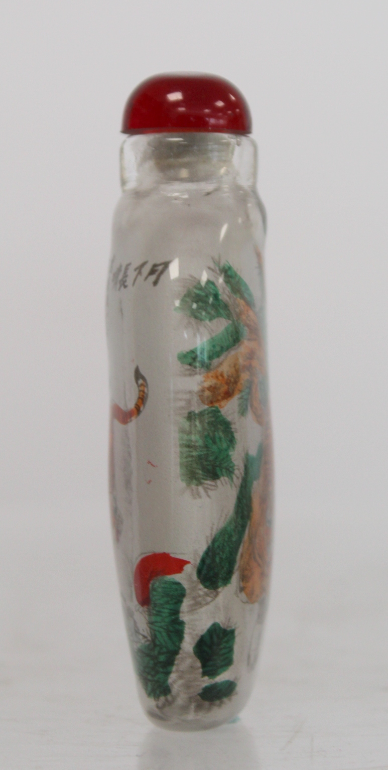 Chinese glass snuff bottle of flattened ovoid form internally decorated with figures of two tigers - Image 4 of 10