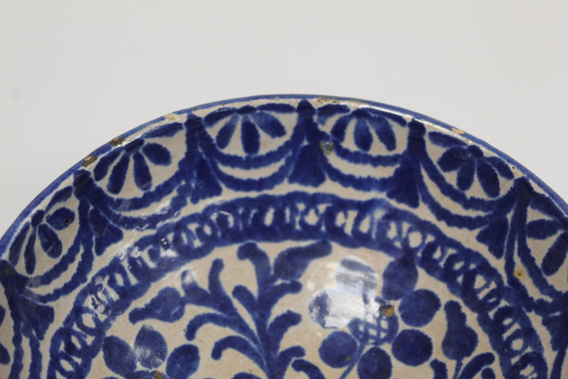 Middle Eastern small earthenware blue and white circular bowl decorated with stylised flowers and - Image 3 of 12