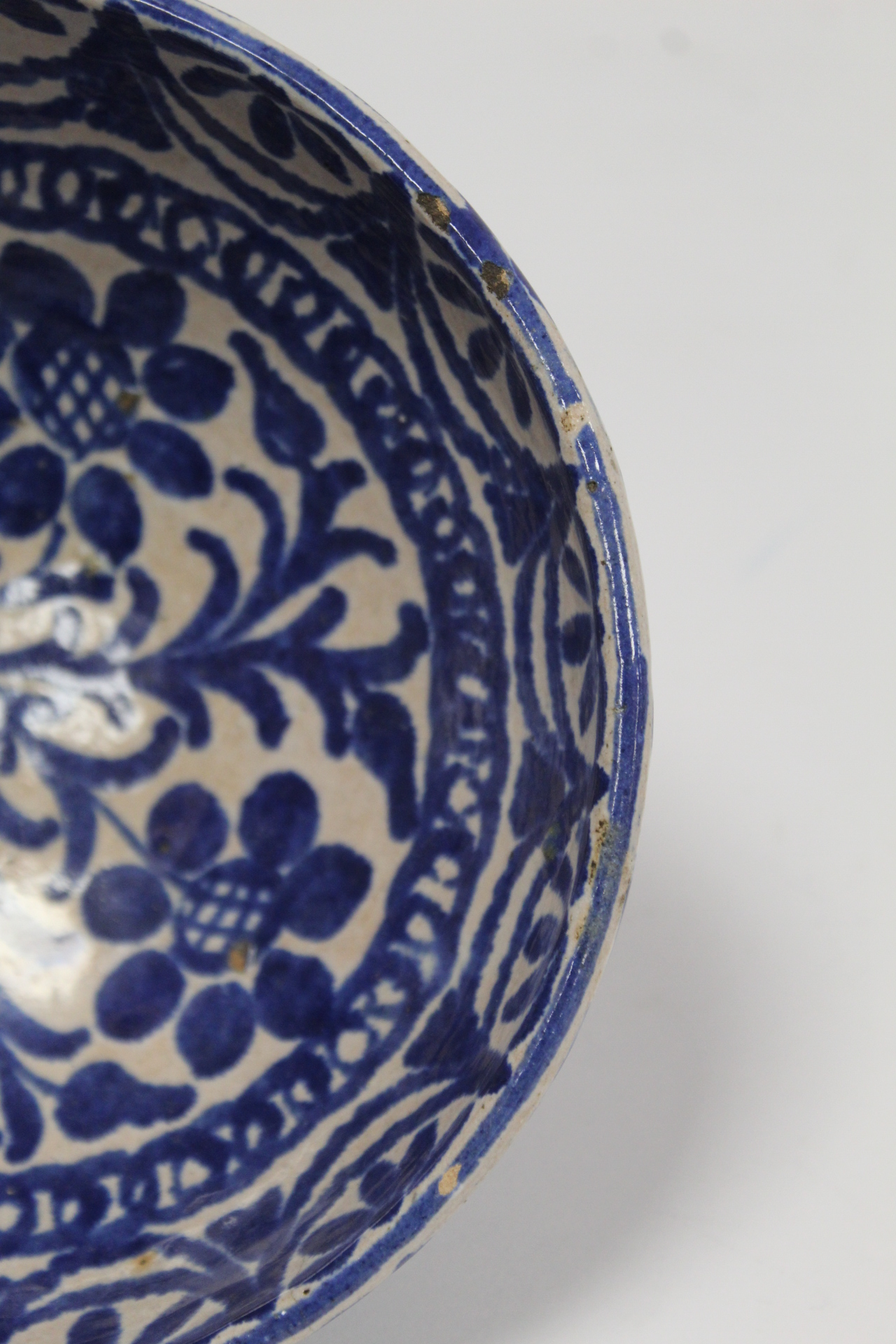 Middle Eastern small earthenware blue and white circular bowl decorated with stylised flowers and - Image 6 of 12