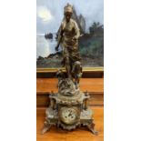 French gilt spelter and onyx figural mantle clock, the top with a standing female allegorical figure