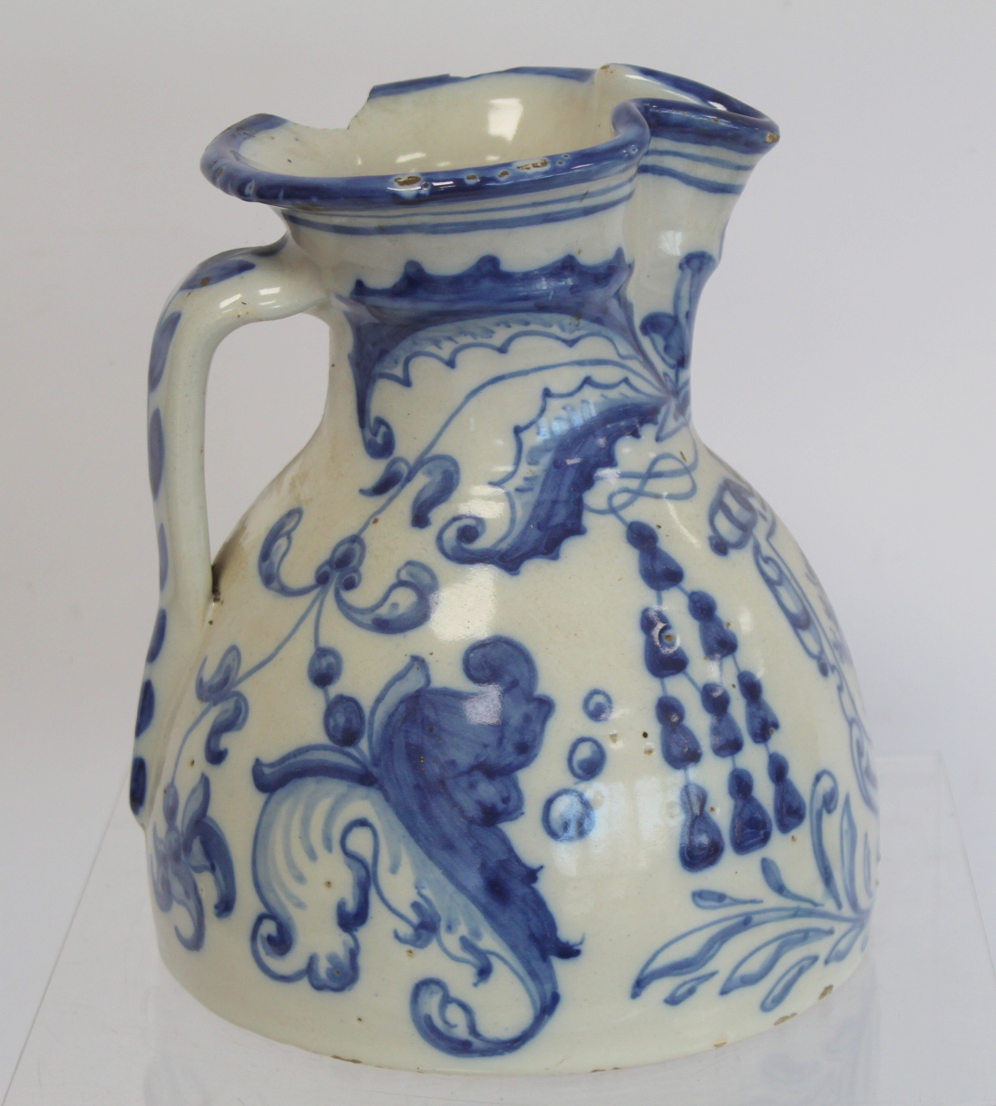 Spanish Talavera de la Reina tin glazed blue and white jug of domed form with trefoil rim, decorated - Image 3 of 8