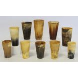 Collection of ten horn beakers, the largest 13cm high, the smallest 9½cm high.  (10).