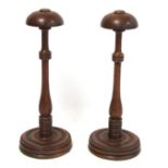 Pair of 19th century oak wig stands, with domed tops on turned knopped baluster stems and turned