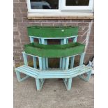 Three tier garden or patio wooden plant stand of angled form with two metal plant troughs, 144cm