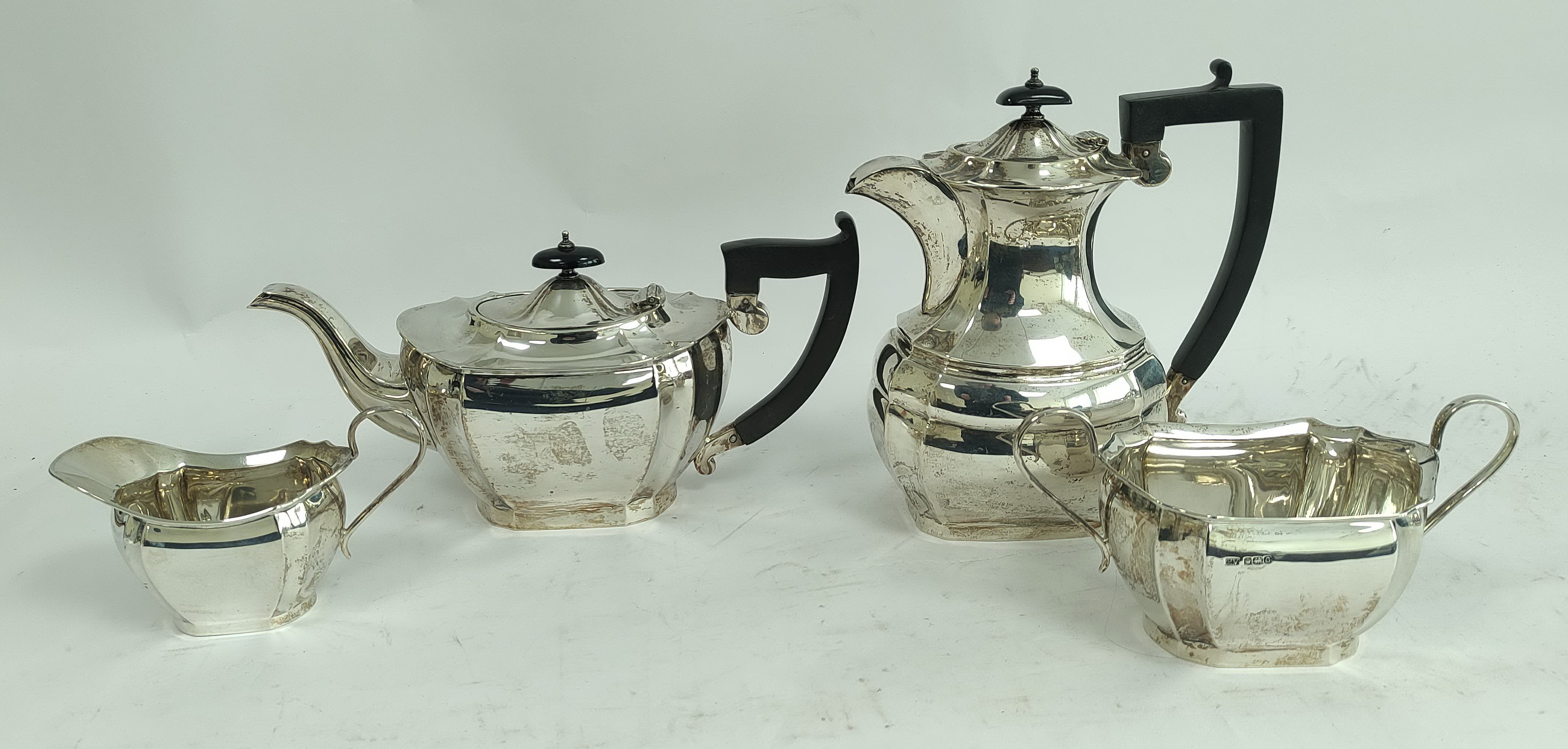 Silver four-piece tea set of boat shape with incurved edges, by Viners Sheffield 1931, 1870g / 59oz.