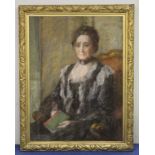 Edwardian School. Three quarter length portrait of a seated lady in mourning dress. Chalk pastels.