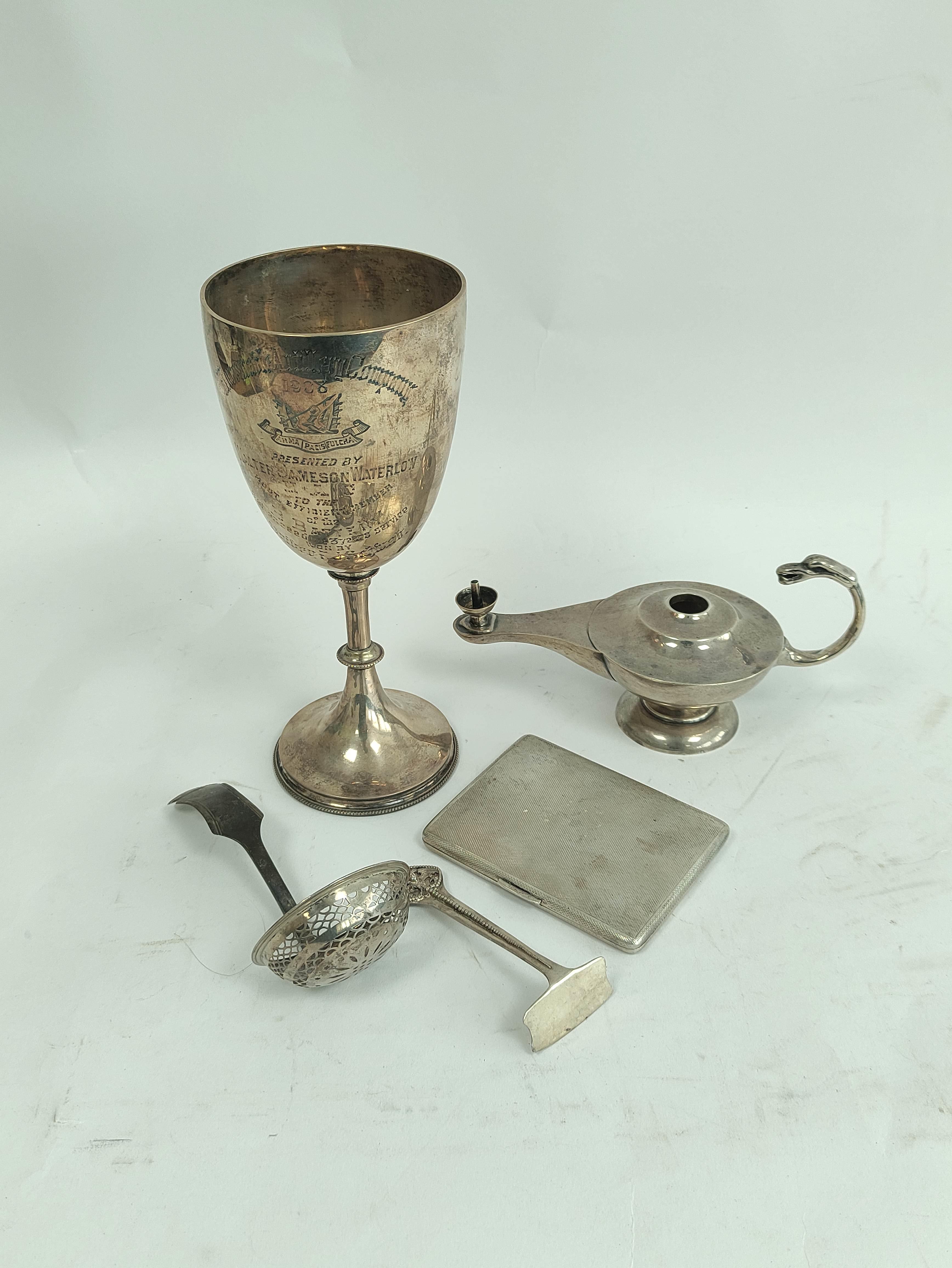 Silver cup, 1908, a Roman lamp lighter, 1904, a Dutch sifter spoon, a cigarette case and a child's