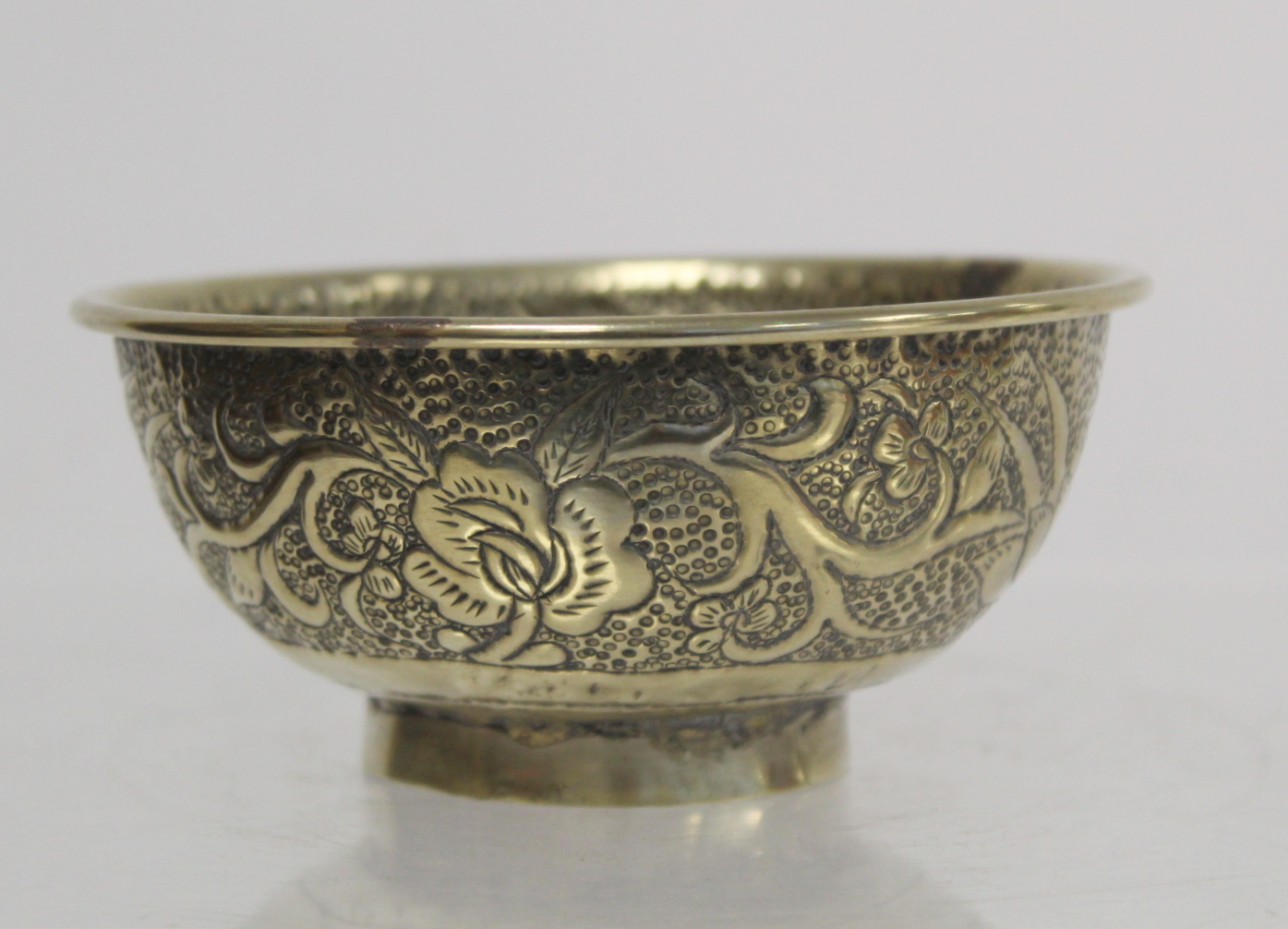 Chinese small white metal bowl with repousse floral band to exterior and two punched character marks - Image 3 of 13