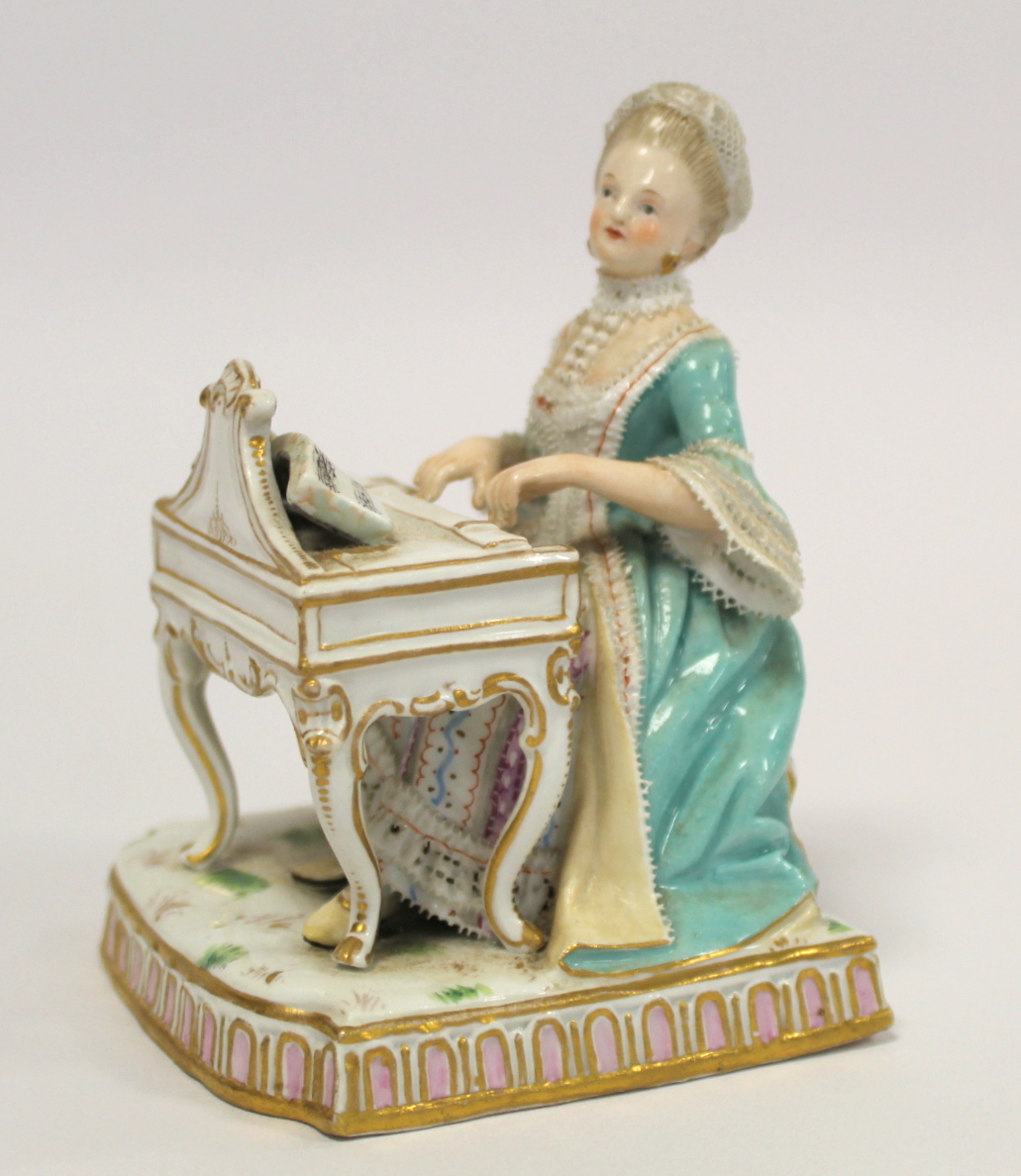 Meissen porcelain figure emblematic of the 'Sense of Sound' in the form of a lady in 18th century