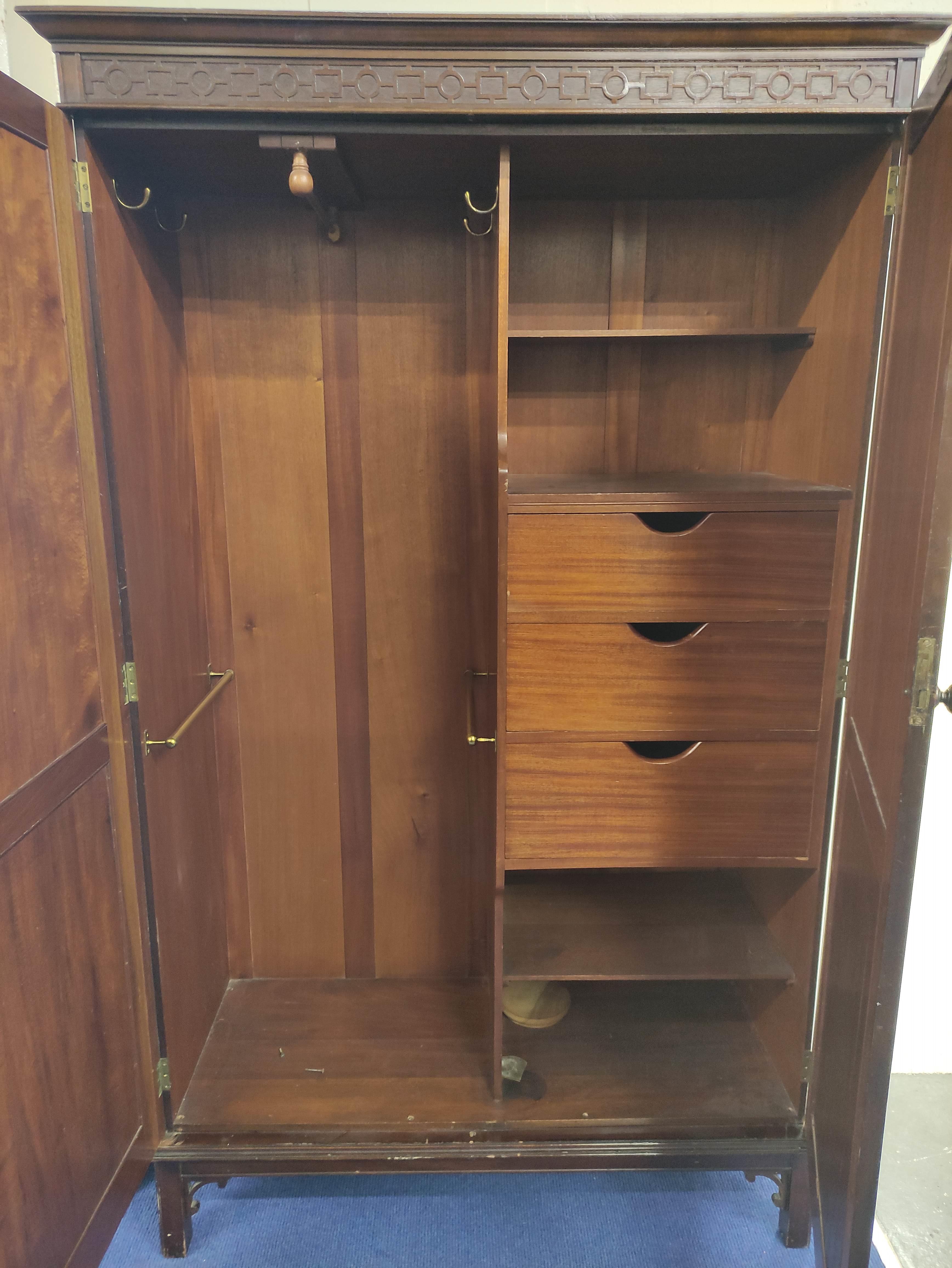 20th century mahogany wardrobe, the pair of double panel doors enclosing interior with hanging - Image 2 of 5