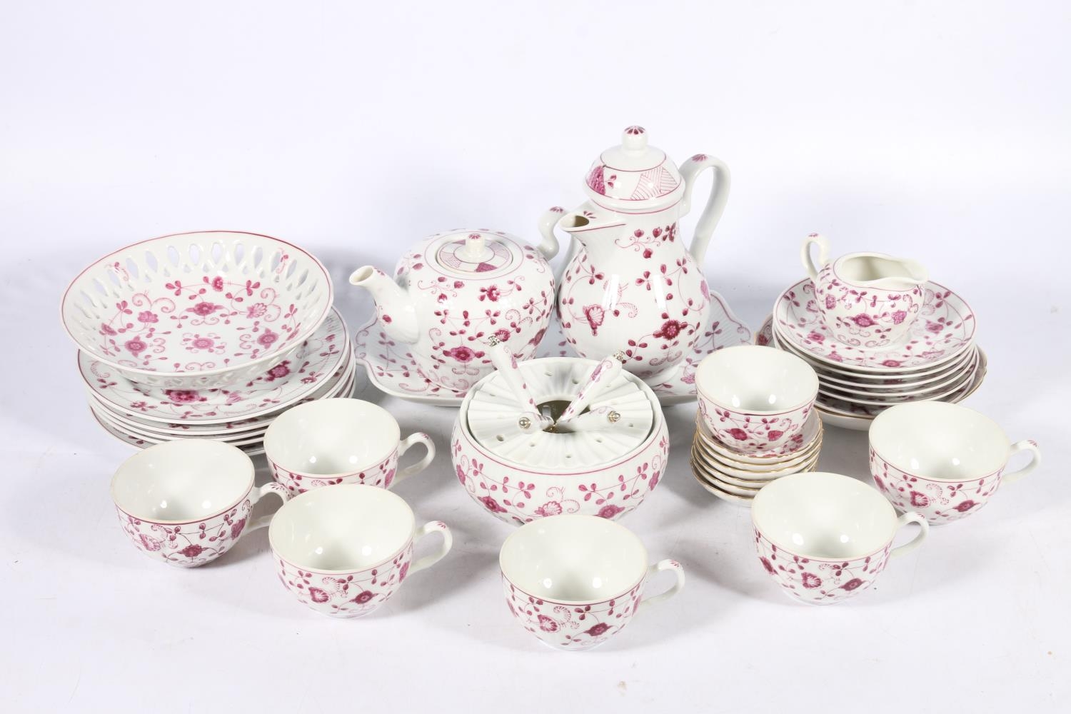 August Warnecke twenty-eight piece China Purpur pattern purple and white coffee and tea set, also