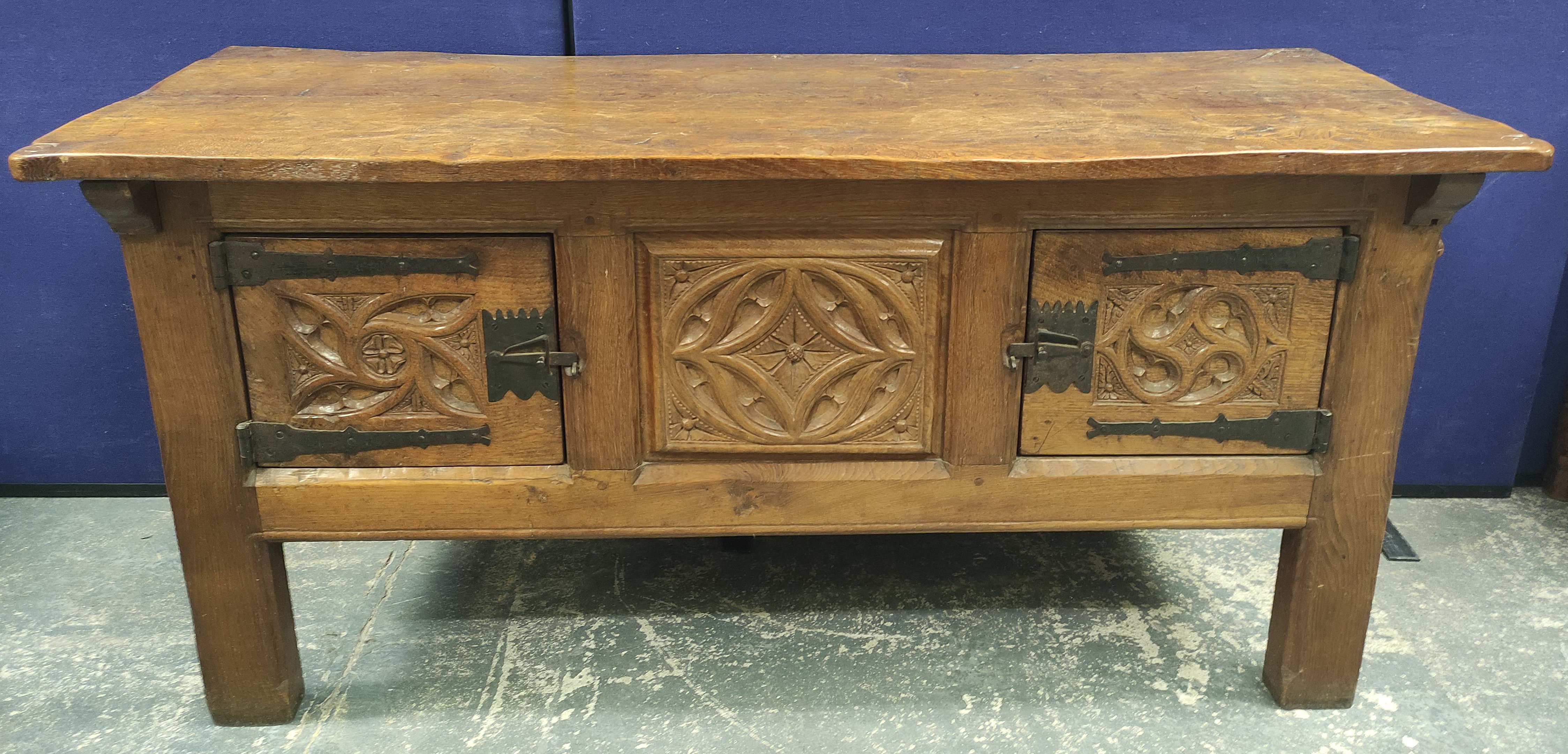 Robert "Mouseman" Thompson, oak sideboard, the rectangular top with scroll incised corners above