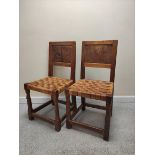 Robert "Mouseman" Thompson set of nine oak dining chairs, each with rustic single panel back above