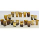 Collection of twenty small horn beakers, one inscribed with date 1887, another "A present from