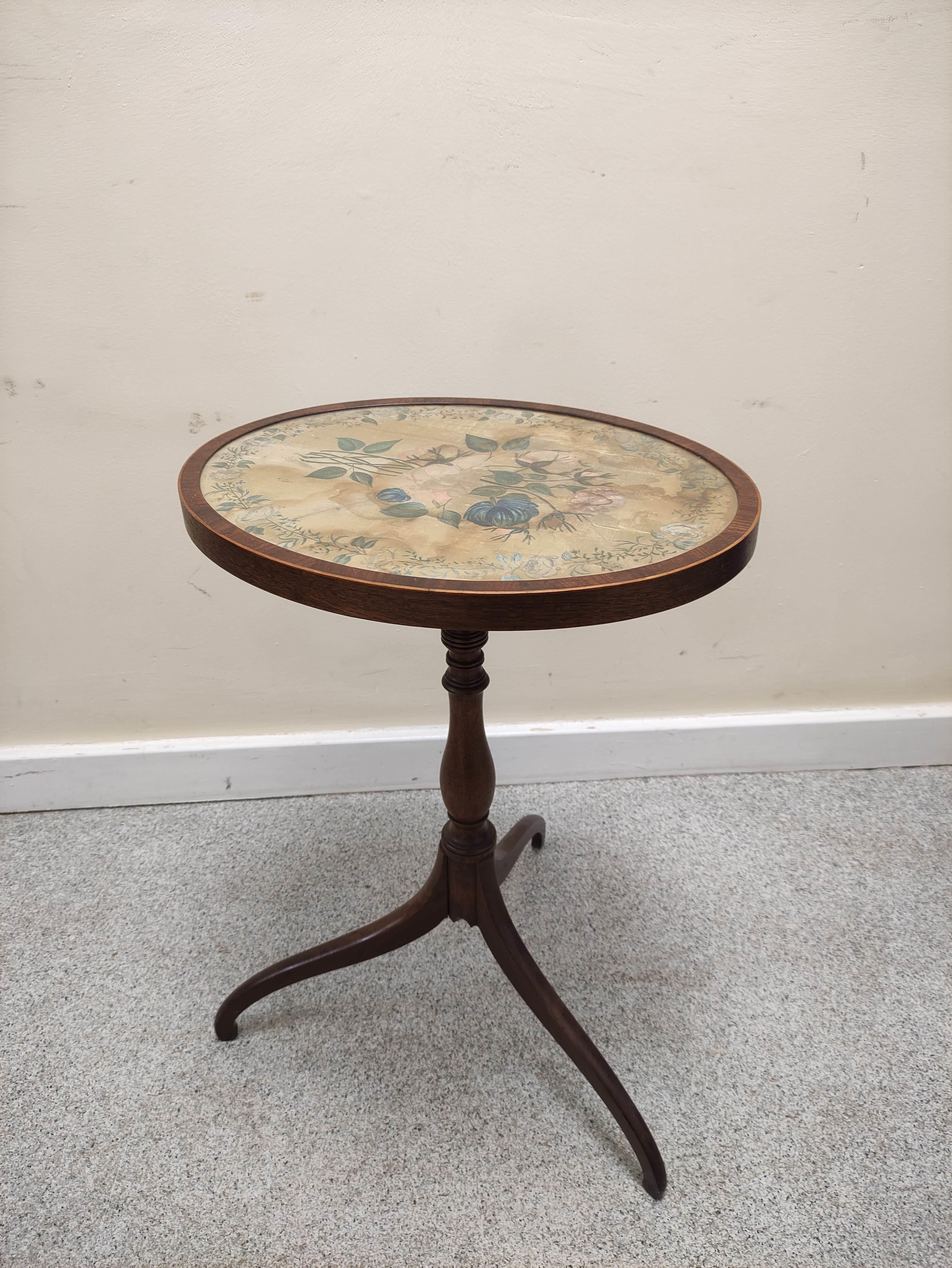 Early 19th century mahogany occasional table, the oval top with florally painted silk under glass