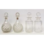Two pairs of 19th or early 20th century cut glass decanters, each approx. 24.5cm high.  (4).