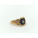 Victorian 18ct gold mourning ring with diamond brilliant collet on black enamel with scroll border