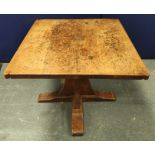 Robert "Mouseman" Thompson oak breakfast table, the square top with incised corner scrolls on