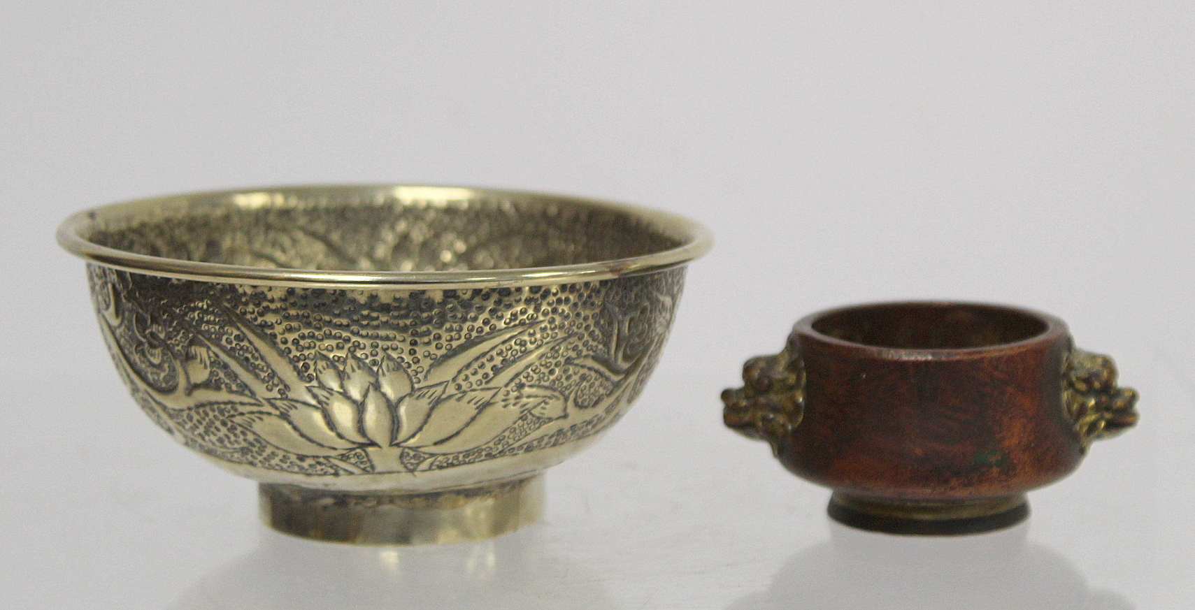 Chinese small white metal bowl with repousse floral band to exterior and two punched character marks