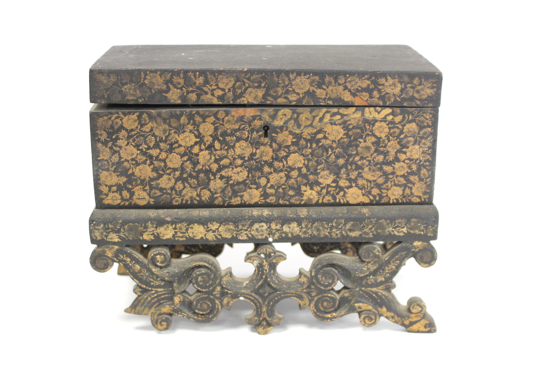 Early 19th century Chinese export black lacquer box on pierced stand with painted gilt floral and