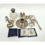 Silver mounted cut glass perfume bottle, 1904, a capstan inkwell, various condiments and three