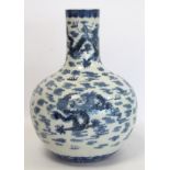 Chinese Qing dynasty large blue and white bottle vase decorated with five five-clawed scrolling