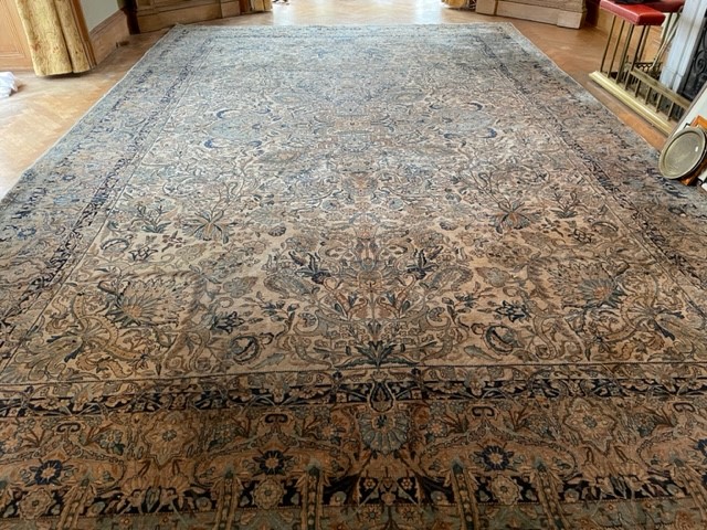 Fine large Persian Kirman carpet with overall foliate decoration of palmettes and other motifs