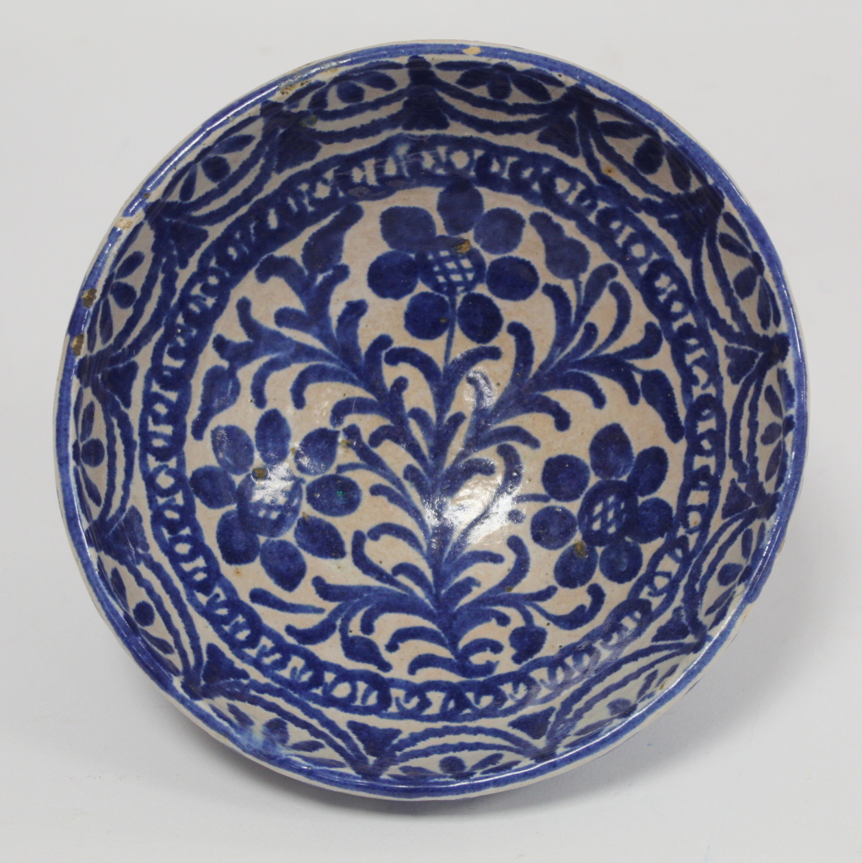 Middle Eastern small earthenware blue and white circular bowl decorated with stylised flowers and - Image 2 of 12