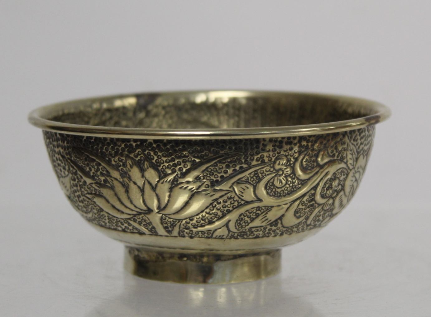 Chinese small white metal bowl with repousse floral band to exterior and two punched character marks - Image 4 of 13