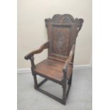 17th century and later oak wainscot armchair, North of England, the carved panelled back above