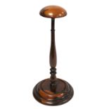 19th century treen wig stand, possibly yew or fruitwood, the domed circular top on tapered knopped