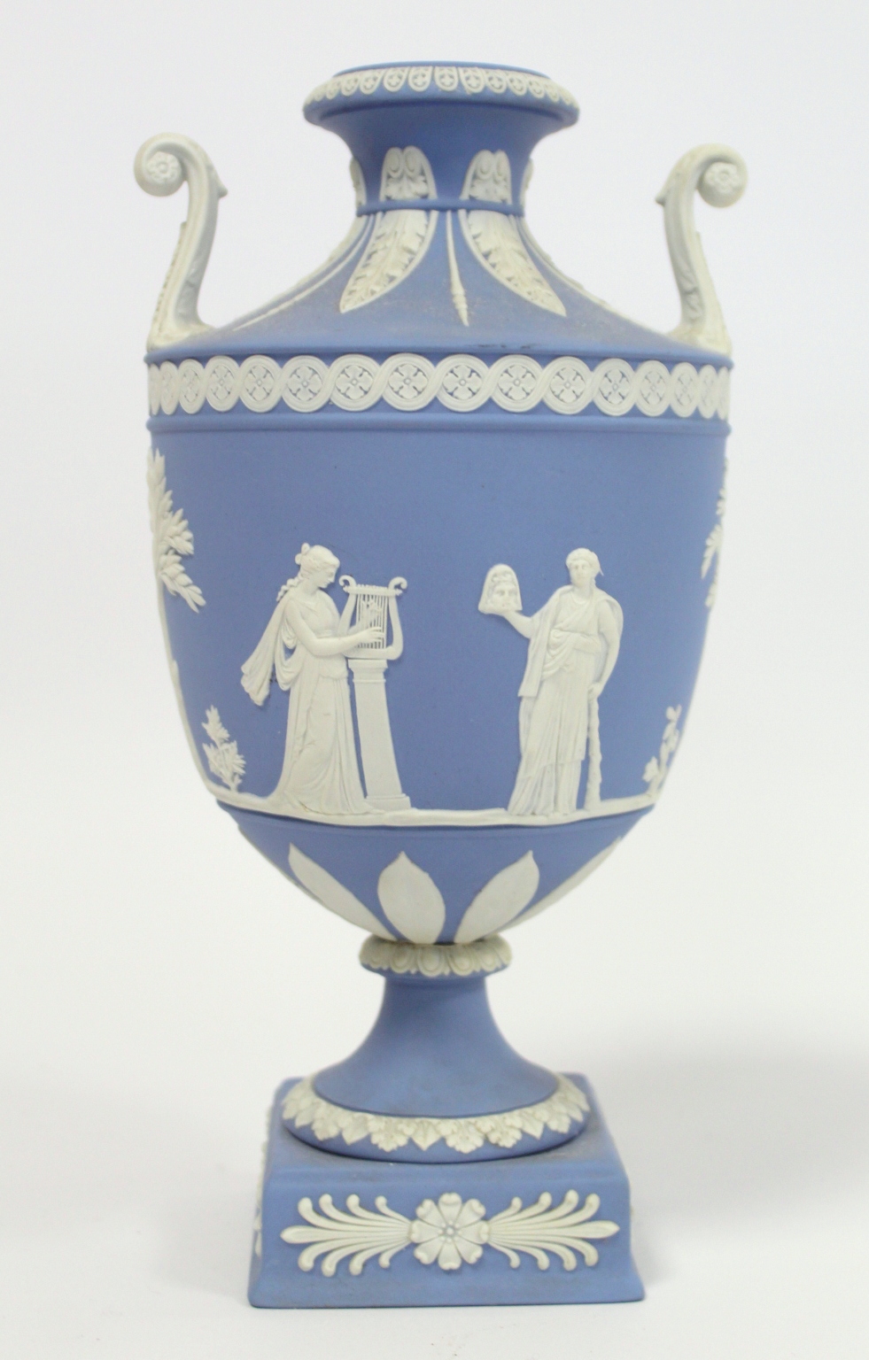 20th century Wedgwood blue jasperware vase of urn form with twin scroll handles, the continuous