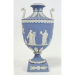 20th century Wedgwood blue jasperware vase of urn form with twin scroll handles, the continuous