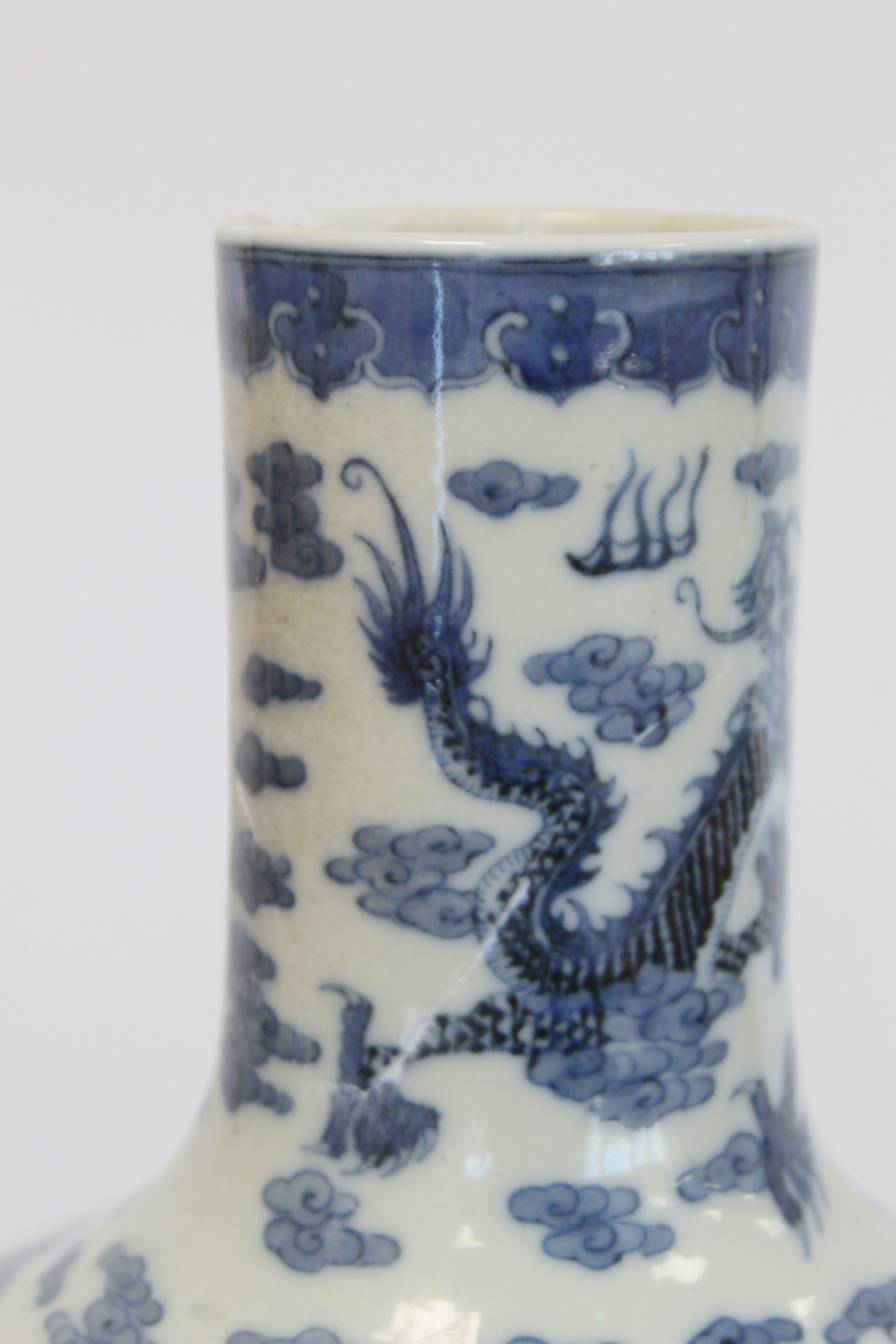 Chinese Qing dynasty large blue and white bottle vase decorated with five five-clawed scrolling - Image 13 of 21