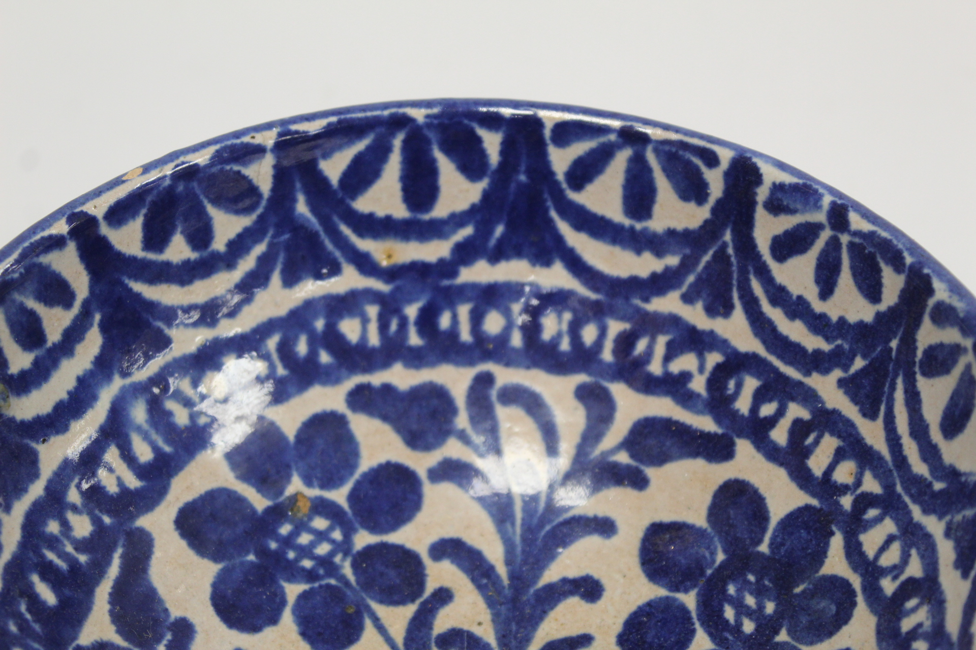 Middle Eastern small earthenware blue and white circular bowl decorated with stylised flowers and - Image 4 of 12