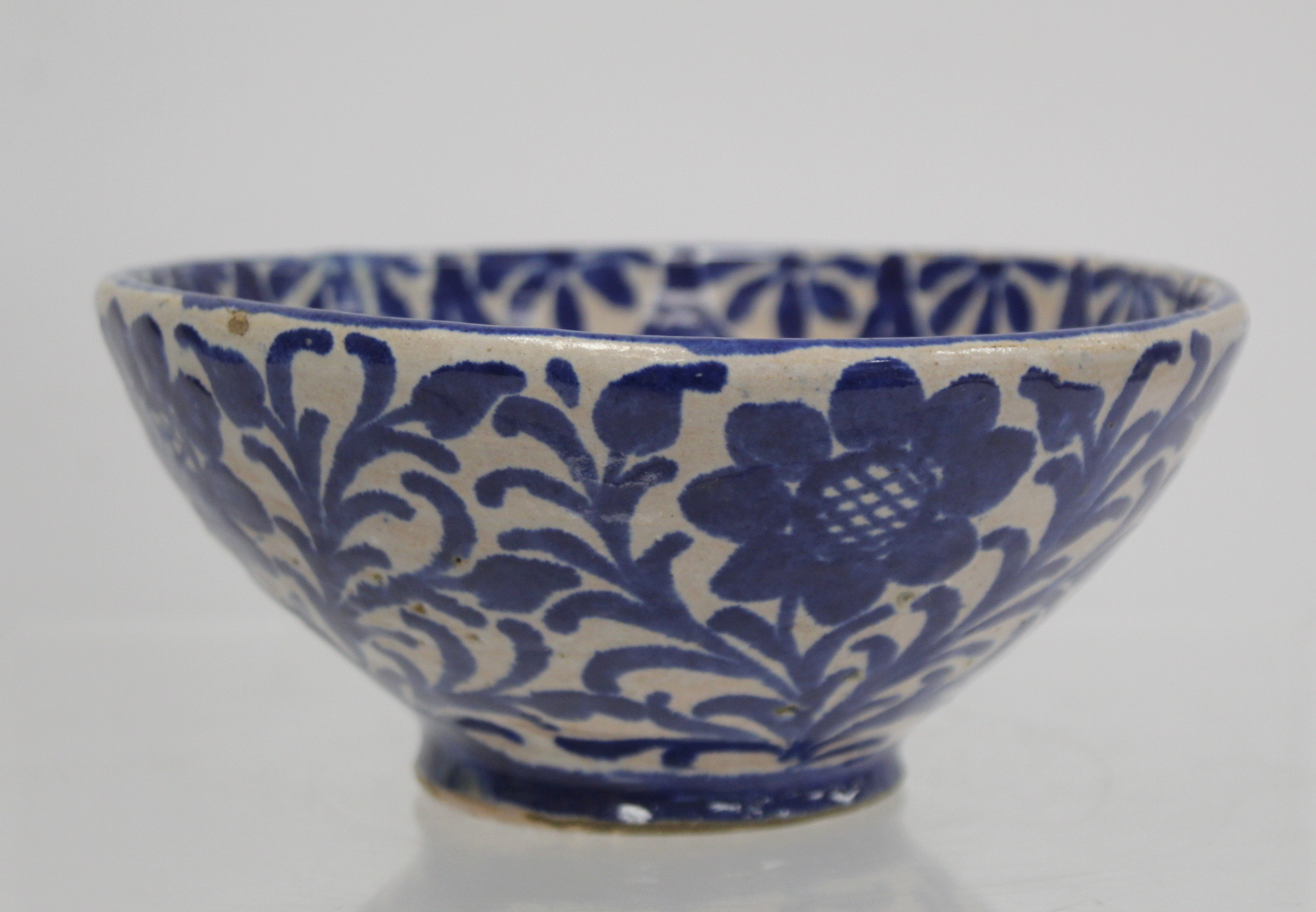 Middle Eastern small earthenware blue and white circular bowl decorated with stylised flowers and - Image 12 of 12