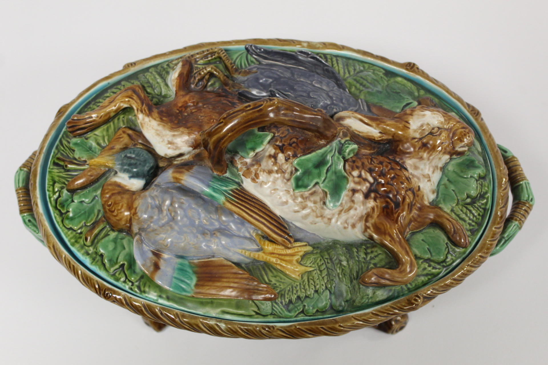 Victorian Minton majolica game pie tureen of twin handled oval form, the relief moulded naturalistic - Image 2 of 22