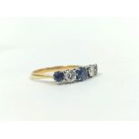Diamond and sapphire five stone ring, two brilliants approximately .3ct in gold and platinum.