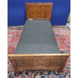 Robert "Mouseman" Thompson oak single bed, the three panels of the headboard each carved with an